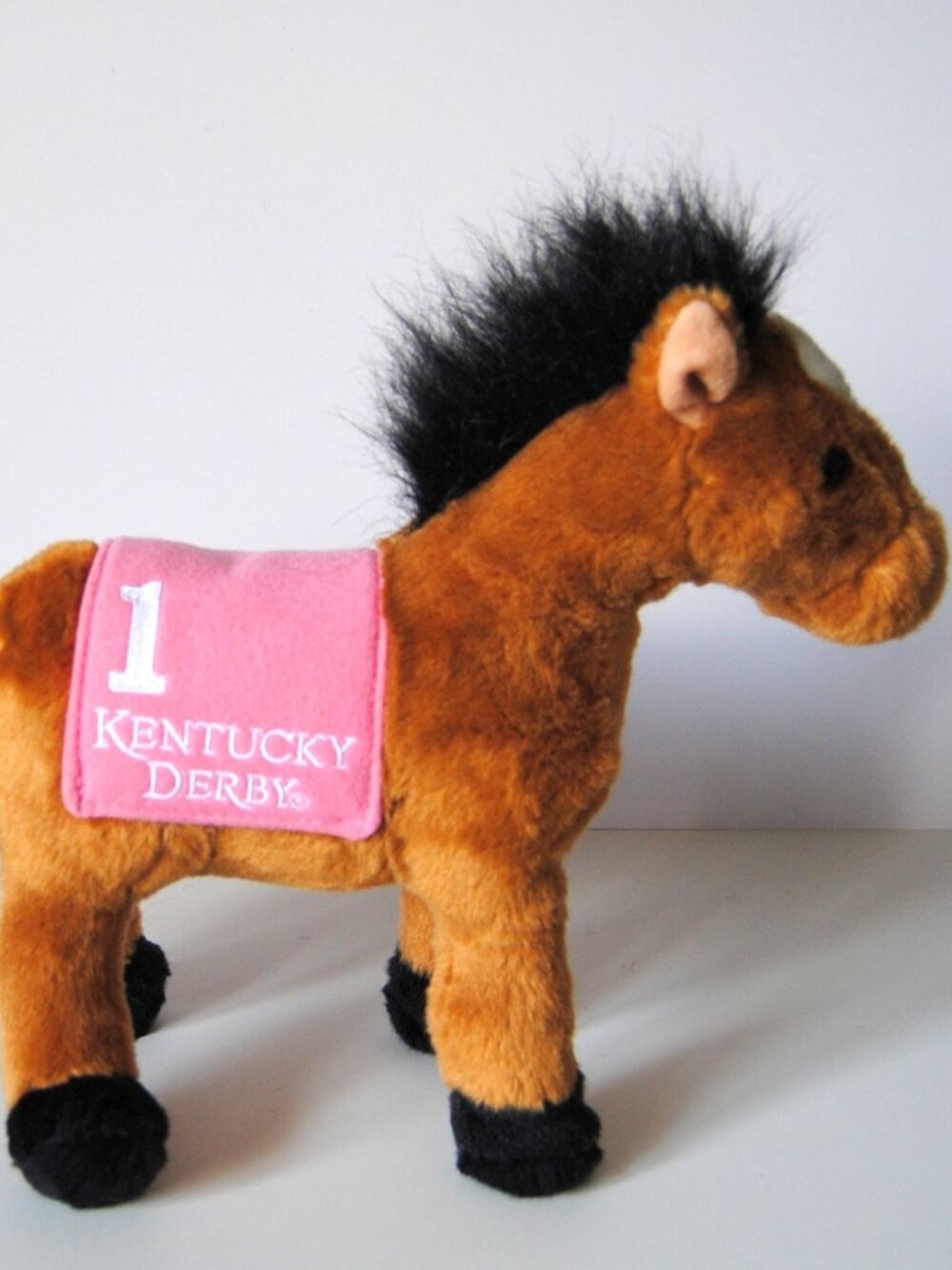 The Aurora Kentucky Derby #1 Plush Horse is a 10‑inch officially licensed Derby